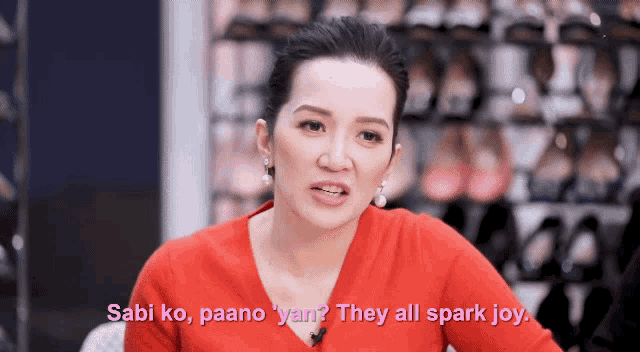 a woman in a red top says sabi ko paano yan they all spark joy