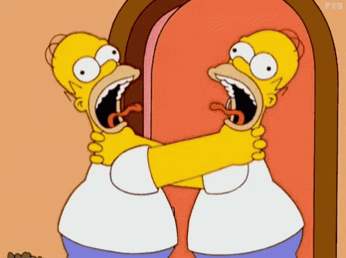 a cartoon of homer simpson with his mouth open and his tongue out
