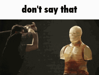 a man standing next to a statue with the words " do n't say that " on the bottom