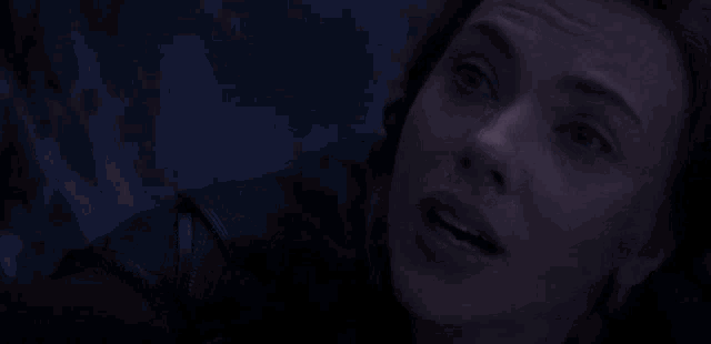 a close up of a woman 's face with the words it 's okay