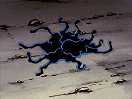 a drawing of a black and blue swirl on a surface