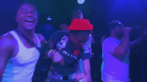 a man in a red hat with the number 8 on his shirt
