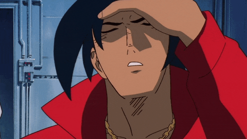 a man in a red jacket is holding his head in pain