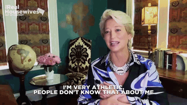 a woman in a blue and black shirt says i 'm very athletic people don 't know about me
