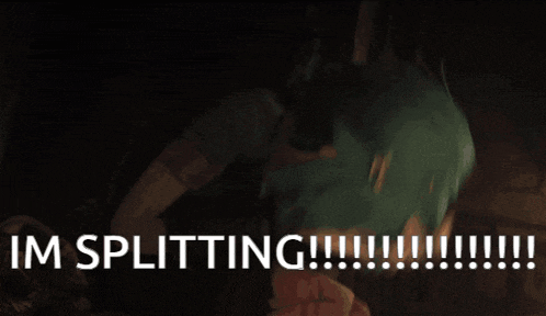 a person with green hair covering their face with their hands and the words i 'm splitting !!!