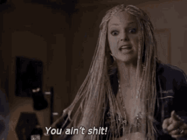 a woman with dreadlocks says you ain t shit