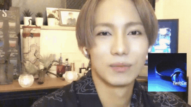 a close up of a man 's face with a sticker that says ' i love you '