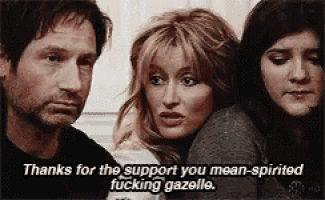 a man and two women are standing next to each other with the words thanks for the support you mean spirited fucking gazelle