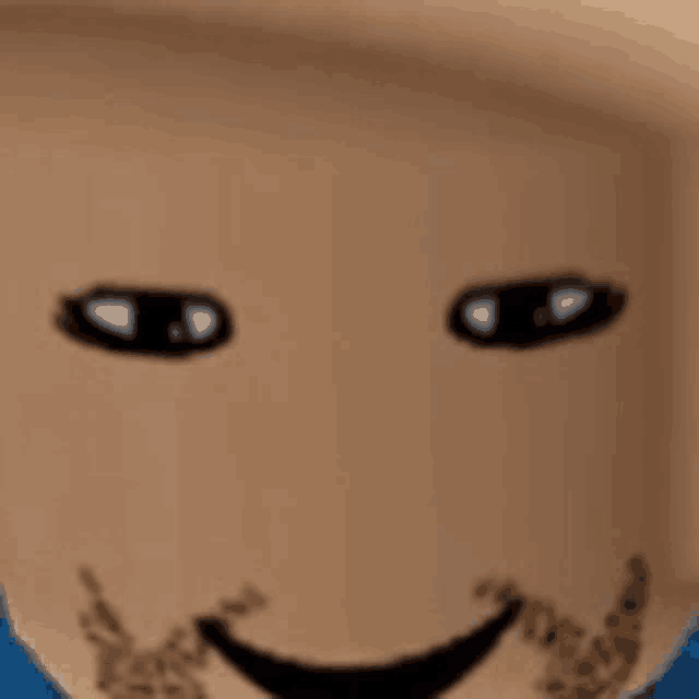 a close up of a person 's face with a smiley face and a beard .