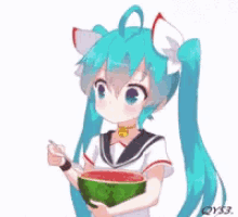 a girl is eating a watermelon with a spoon .