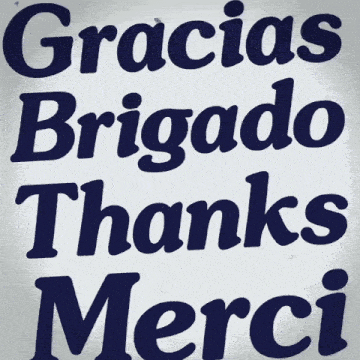 a sign that says gracias brigado thanks merci in blue letters