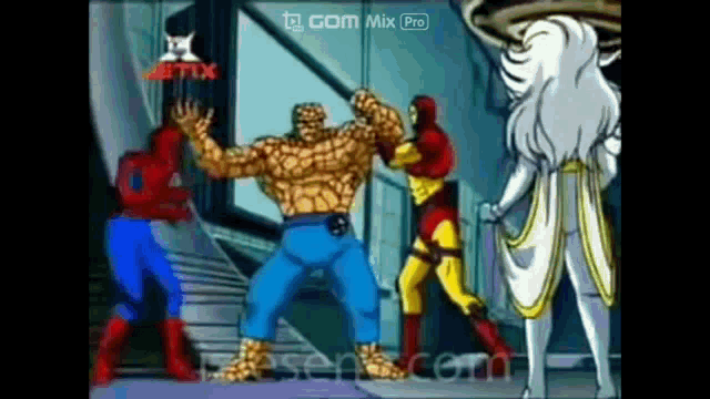 a group of cartoon characters are standing next to each other in front of a sign that says gom mix pro .