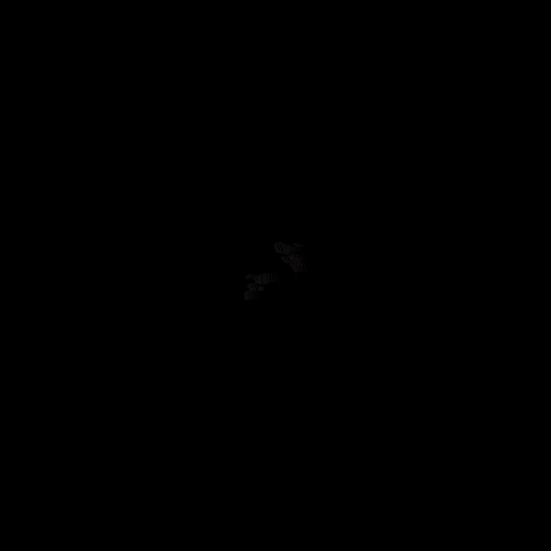 a computer generated image of a glowing star on a dark background .
