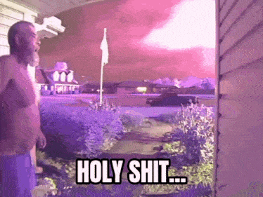 a man standing in front of a house watching a lightning storm with the words holy shit written on the bottom