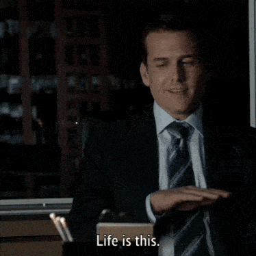 a man wearing a suit and tie says i like this