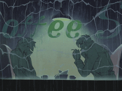 two men are sitting in front of a coffee sign