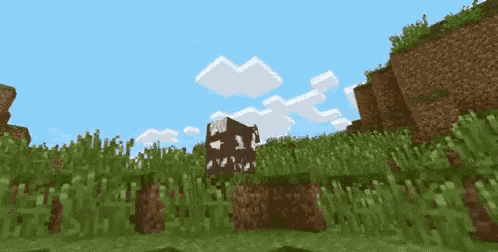 a sheep is standing in the grass in a minecraft game .