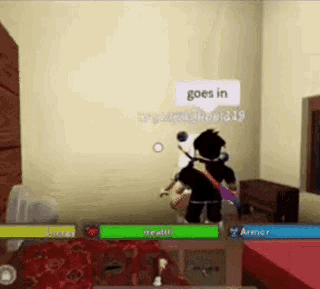 a person is playing a video game in a room with a speech bubble that says goes in .