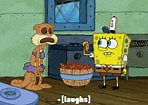 spongebob squarepants and sandy cheeks are standing next to each other in a room .