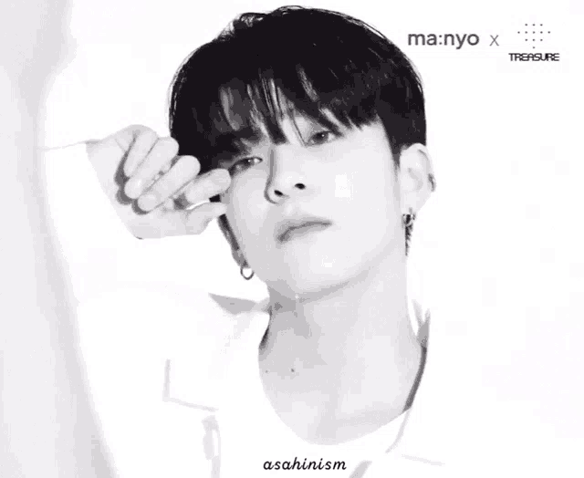 a black and white photo of a young man with ma nyo x treasure written on the bottom right