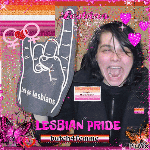 a picture of a woman holding a foam hand that says lesbians