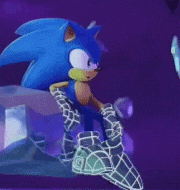 a sonic the hedgehog is sitting on a purple surface