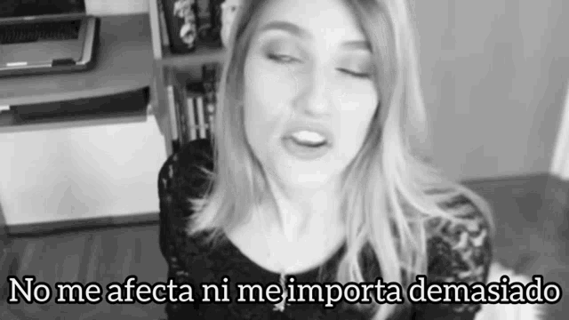 a black and white photo of a woman with the words no me afecta ni me importa demasiado