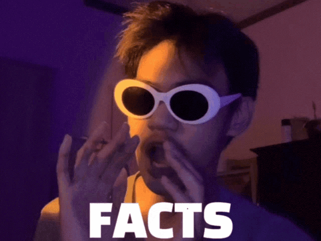 a man wearing sunglasses with the word yeah on the bottom