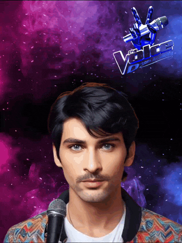 a man is holding a microphone in front of a sign that says the voice