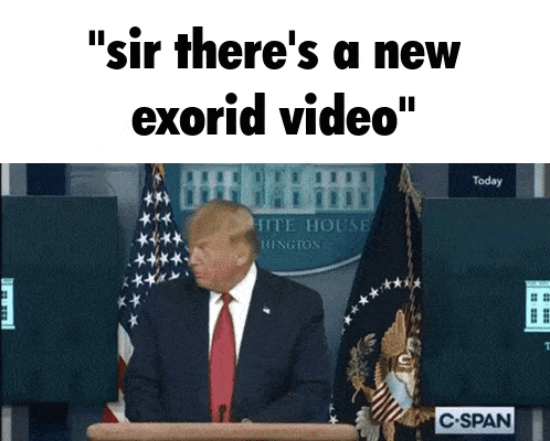 a man in a suit and tie stands at a podium and says " sir there 's a new exorcid video "