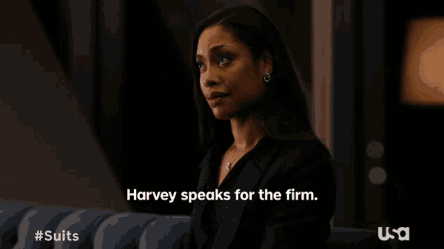 a woman is sitting on a couch with the caption harvey speaks for the firm