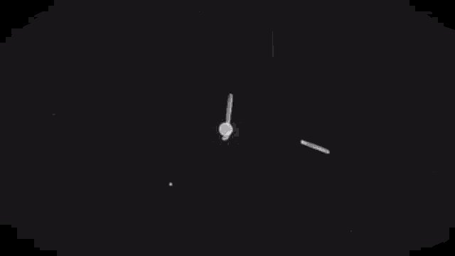 a black and white drawing of fireworks exploding in the night sky