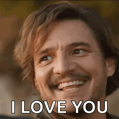 a man is smiling and saying `` i love you '' .