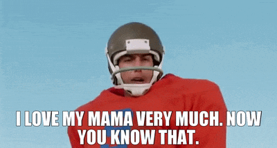 a man wearing a football helmet and a red shirt is saying i love my mama very much . now you know that .