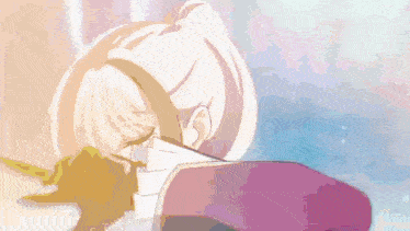 a close up of a person 's head with a bun on it