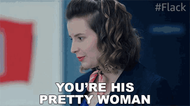 a woman says " you 're his pretty woman " in a video