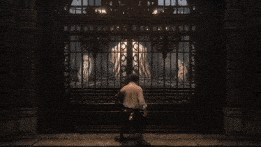 a person in a white robe is holding a purple lightning bolt