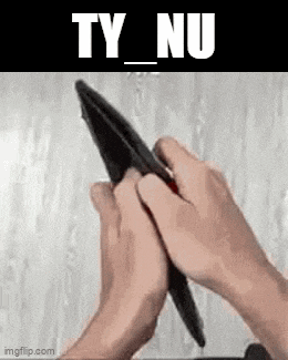 a person is holding an empty wallet in their hands with the words `` ty_nu '' written on it .