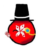 a red ball with a flower on it and a top hat on it .