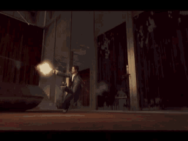 a man is flying through the air with a gun