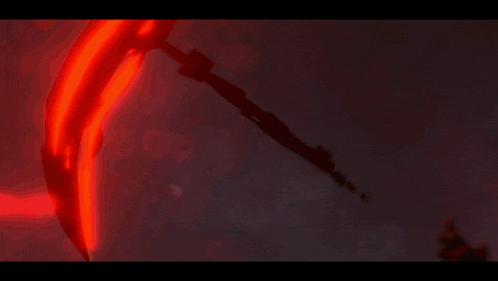 a giant robot holding a sword and a torch in a dark room