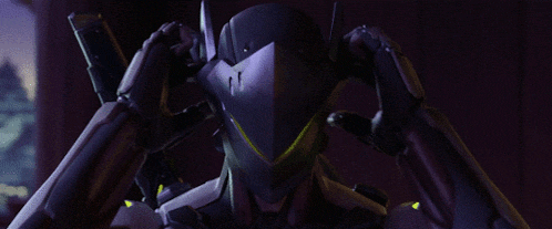 a robot is holding a gun in his hand
