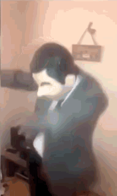 a man in a suit and tie is wearing a mask