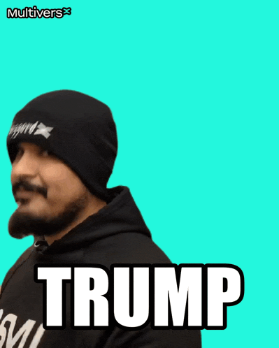 a man with a beard wearing a beanie and a hoodie that says trump