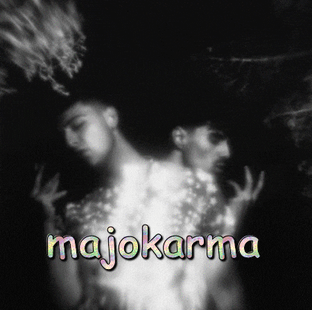 a black and white photo of two men with the words majokarma on the bottom