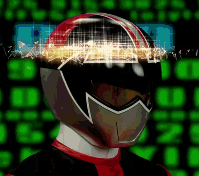 a man wearing a helmet and goggles with a glowing light coming out of it