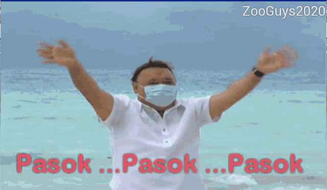 a man wearing a face mask with the words mga trolls written below him