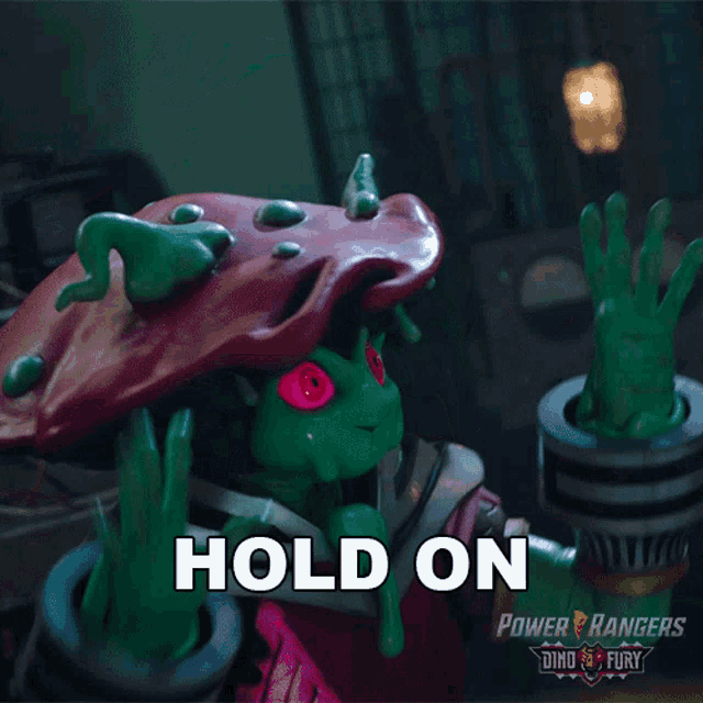 a poster for power rangers dino fury shows a green monster giving a thumbs up