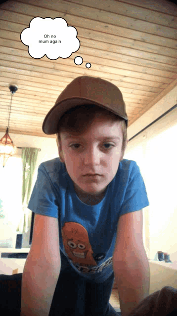 a boy wearing a hat and a blue shirt says oh no mum again