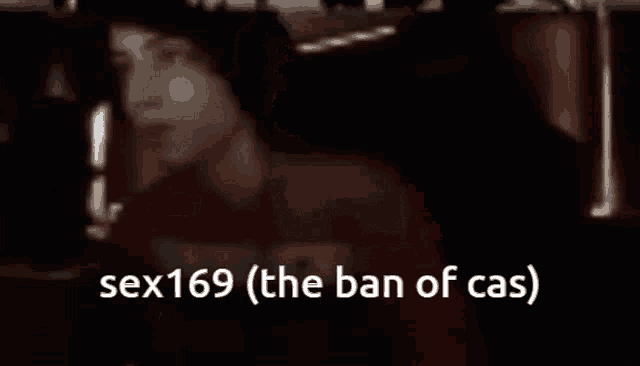 a blurry picture of a person with the words sex169 ( the ban of cas ) written in the corner .